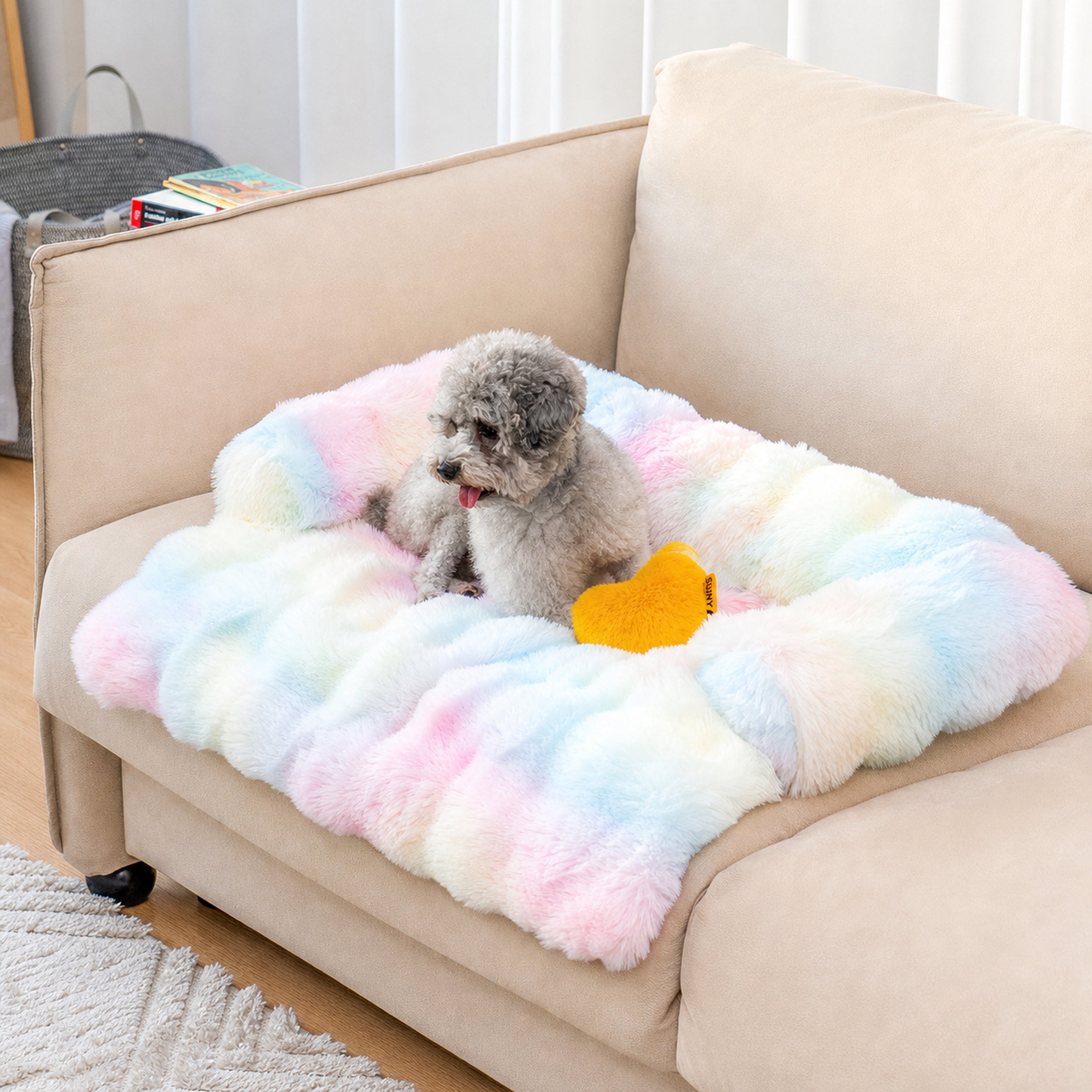 Fluffy calming colorful dog bed with dog on sofa without logo