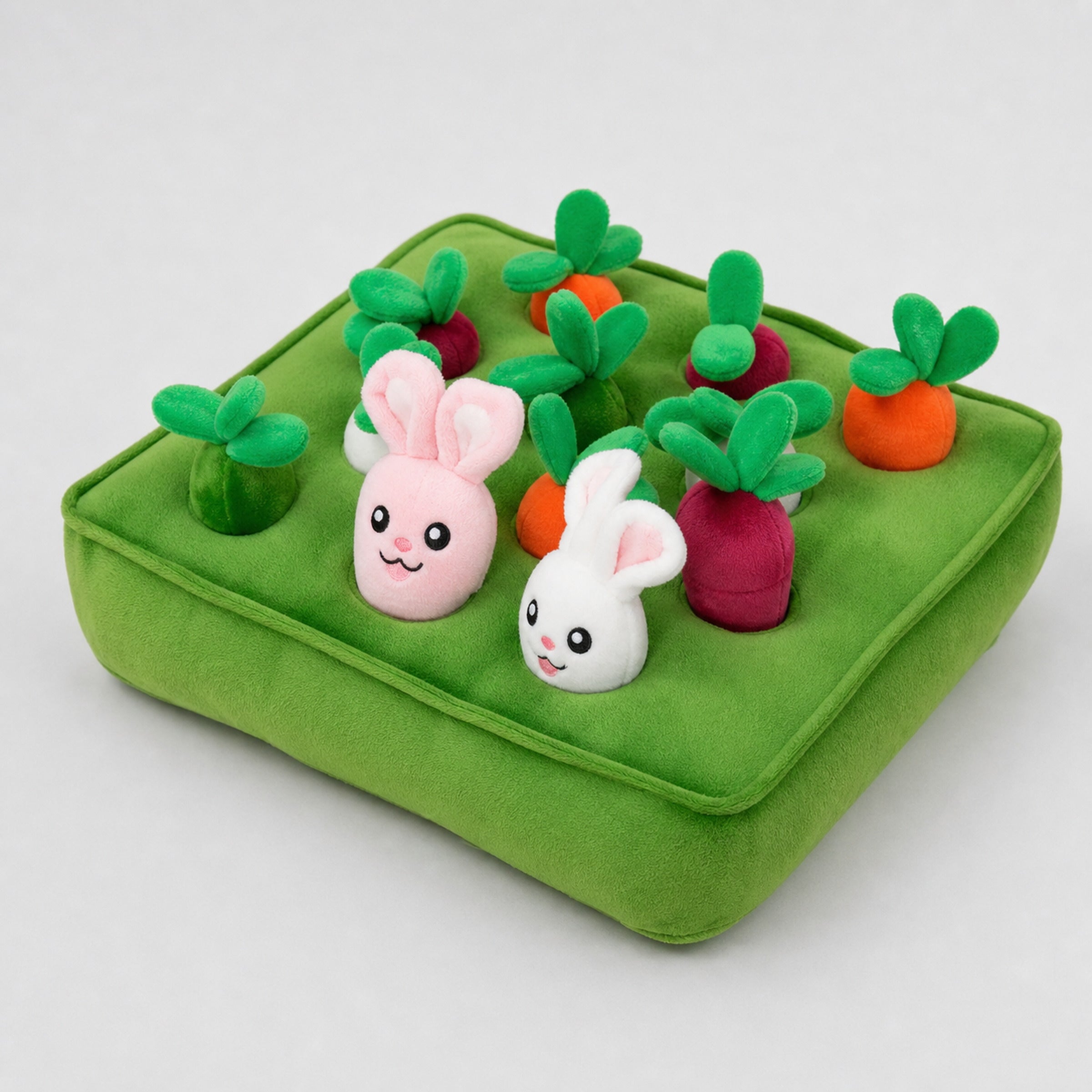 Green carrot snuffle mat dog puzzle toy with plush bunnies and vegetables