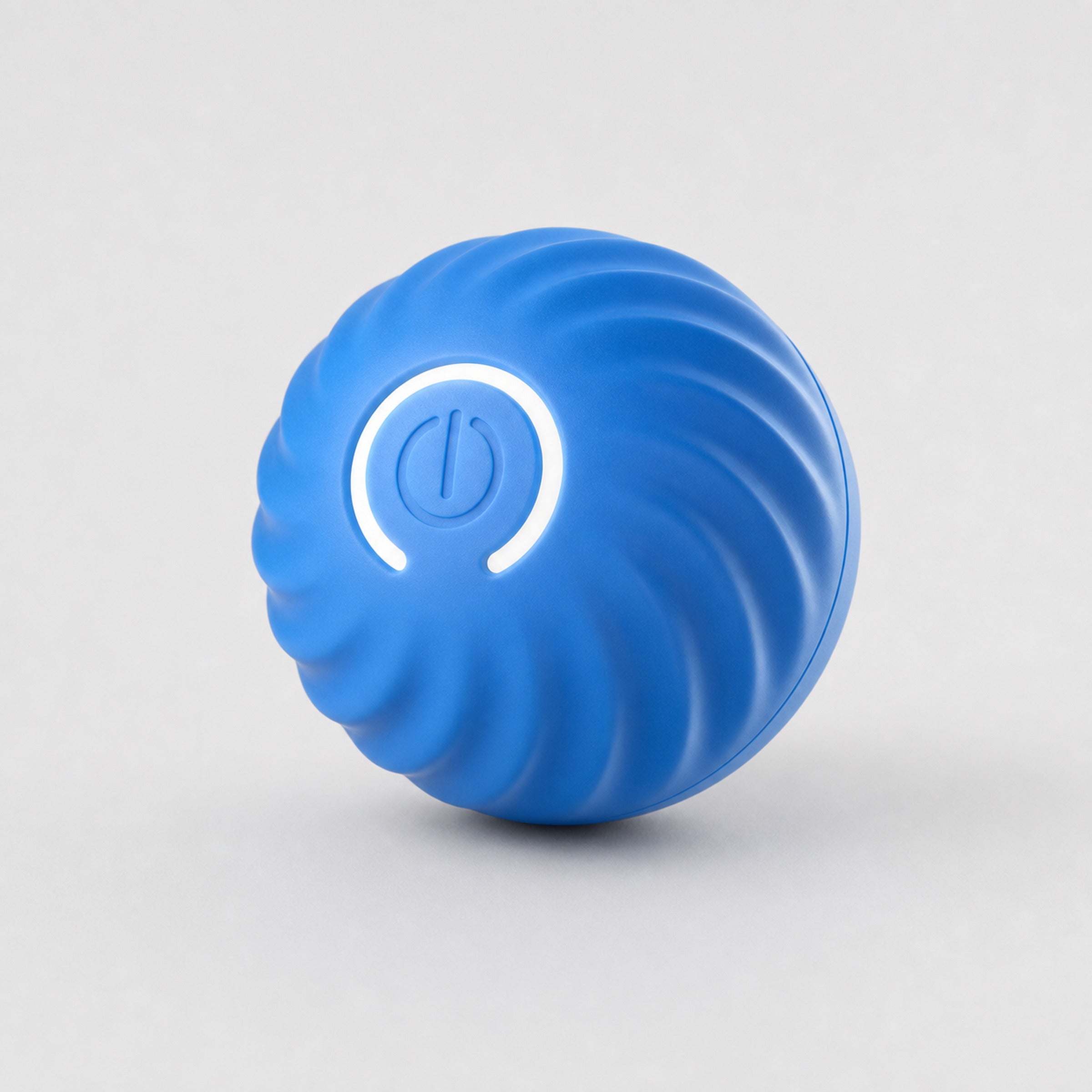 Blue interactive smart dog ball with power button on light grey studio background